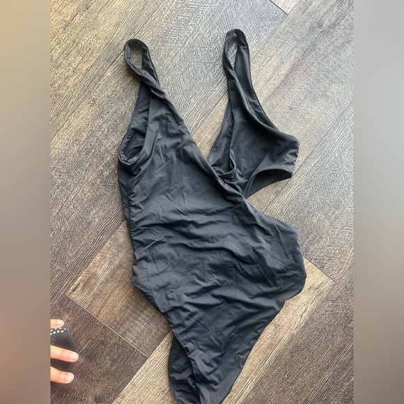Black one piece bathing suit. - Picture 4 of 6